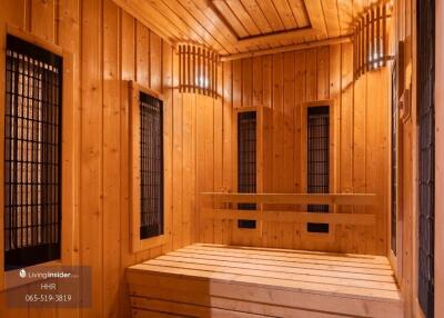 Wooden sauna with benches and heaters