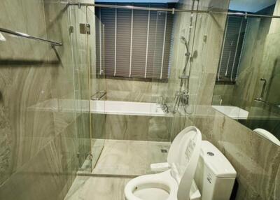 Modern bathroom with bathtub and shower