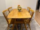 Dining area with wooden table and chairs