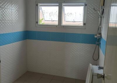 Modern bathroom with a shower and window