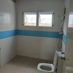 Modern bathroom with a shower and window