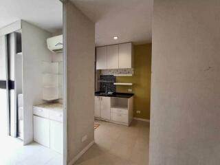 Modern kitchen with white cabinetry and granite countertops