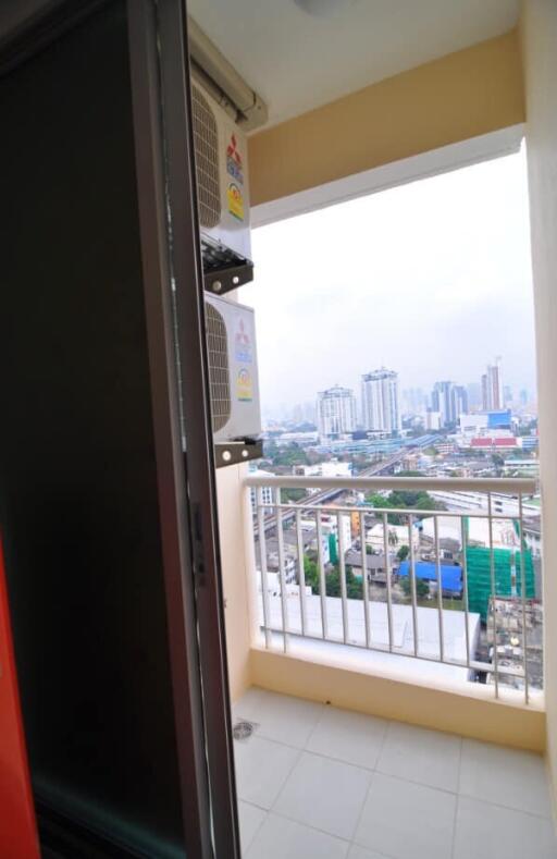 View of balcony with city skyline