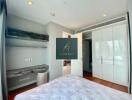 Modern bedroom with built-in wardrobe and storage shelves