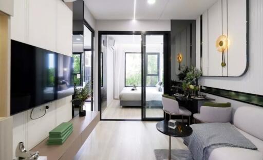 Modern living room with open bedroom