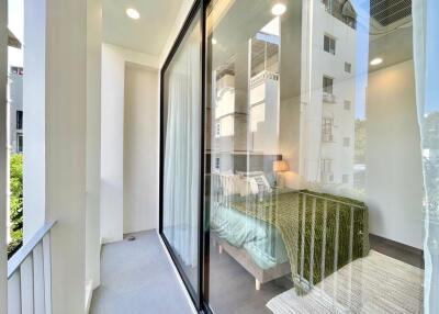 Balcony with view into a bedroom