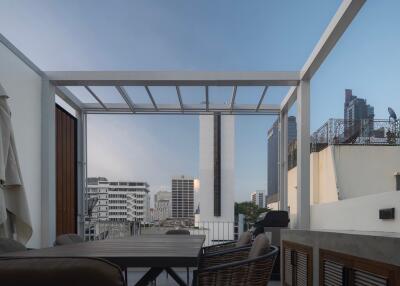 Rooftop seating area with city view