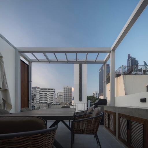 Rooftop seating area with city view