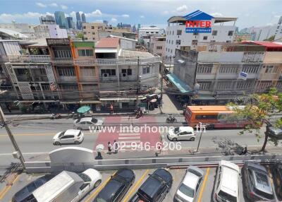 Street view from the building with nearby amenities