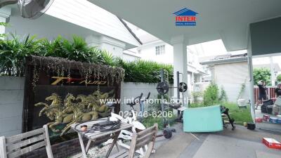 Outdoor space with plants and exercise equipment