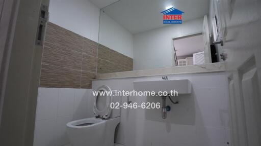 Modern bathroom with toilet and sink