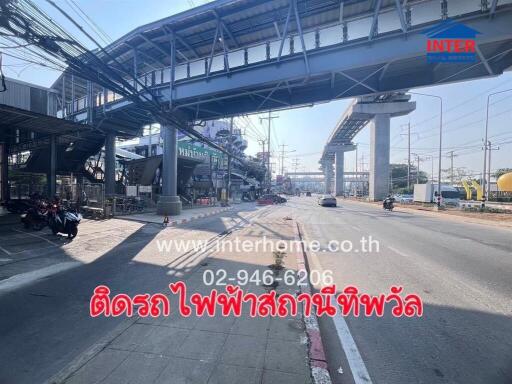 Street view with elevated train line