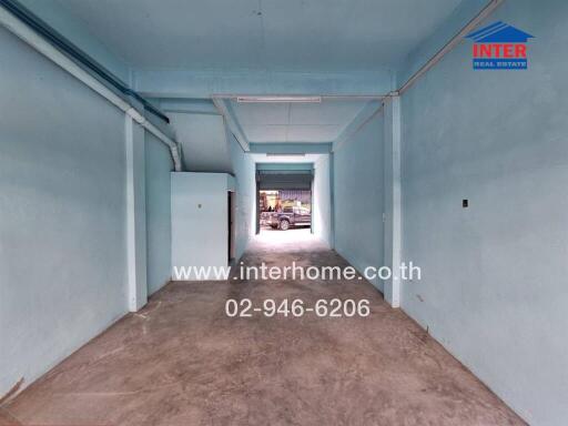 Empty interior space with concrete floor