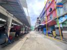 Street view of a row of buildings showcasing a residential area