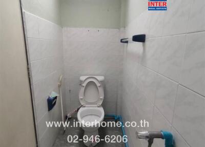 Bathroom with toilet and plumbing