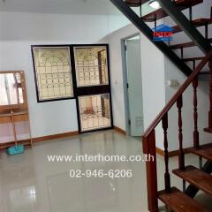 living area with staircase