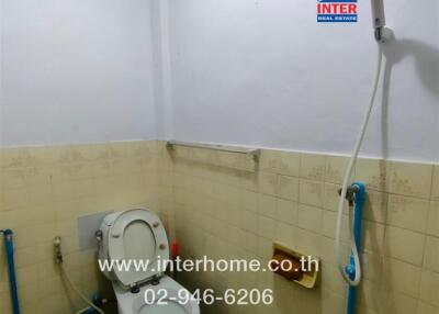 Bathroom with toilet and shower