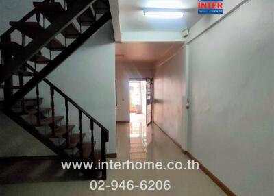 Interior hallway with staircase in a building