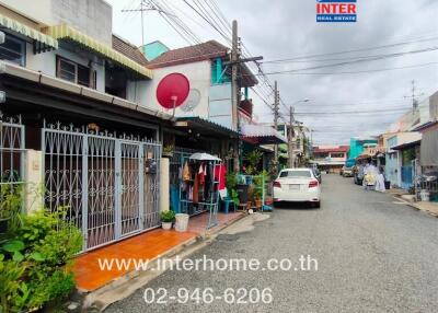 Front view of residential buildings on a street