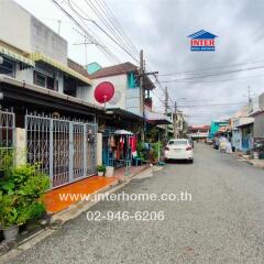 Front view of residential buildings on a street