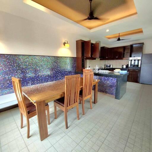 Modern kitchen with dining area