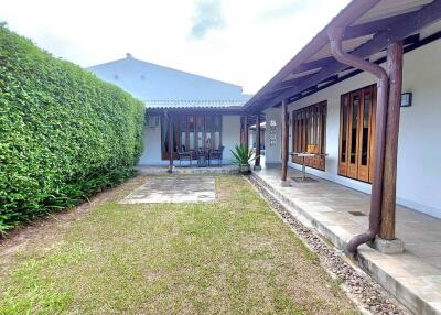 Outdoor area with lawn and patio