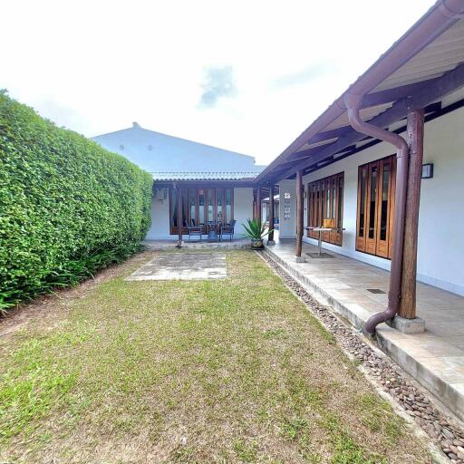 Outdoor area with lawn and patio