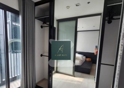 Modern bedroom with large mirror and sliding door wardrobe