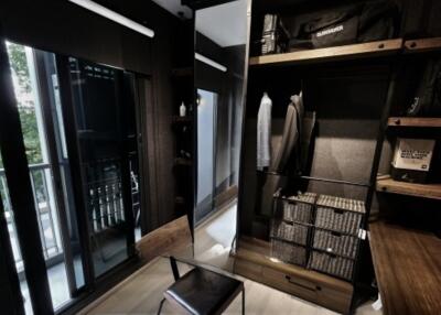 Walk-in closet with shelves and hanging space