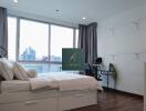 Modern bedroom with large windows and city view