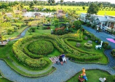 Beautifully landscaped garden with pathways and seating areas