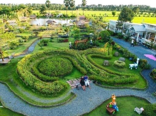 Beautifully landscaped garden with pathways and seating areas