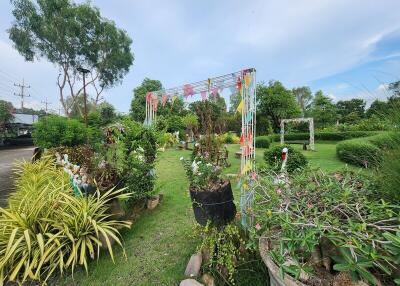 Beautiful garden with decorative plants and archways