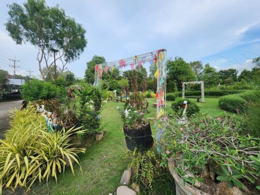 Beautiful garden with decorative plants and archways