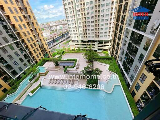 Overview of apartment complex with pool area