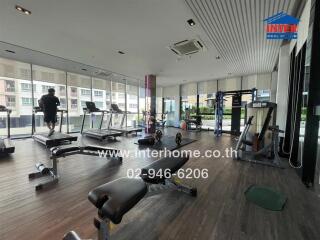 Modern gym with various exercise equipment