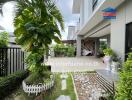 Outdoor area of a modern home with plants and a patio