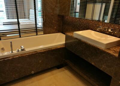 Modern bathroom with a bathtub and sink