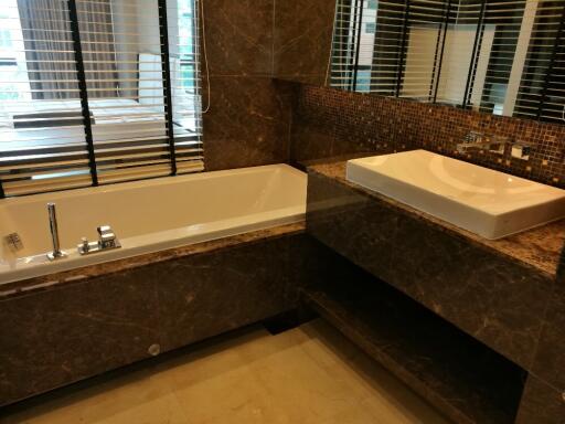 Modern bathroom with a bathtub and sink