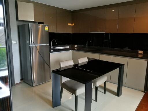 Modern kitchen with dining table