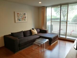 Living room with sofa and large window