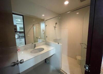 Modern bathroom with a glass-enclosed shower