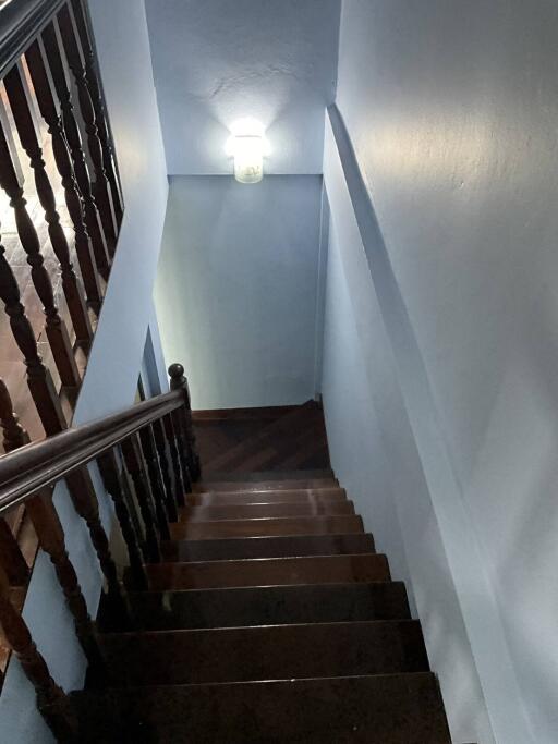 Staircase leading down to a lower floor