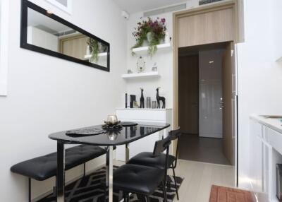 Modern dining area with black furniture