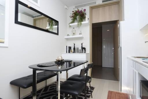 Modern dining area with black furniture