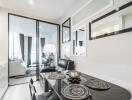 Modern living area with dining table and glass doors