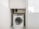 Compact laundry area with washing machine