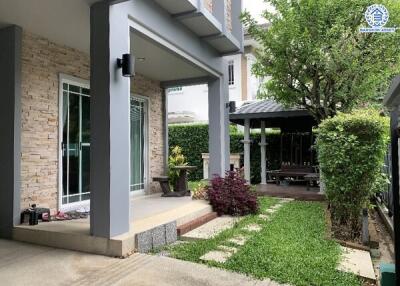 Outdoor patio area with garden