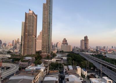 City view with tall buildings and houses