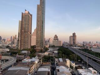 City view with tall buildings and houses